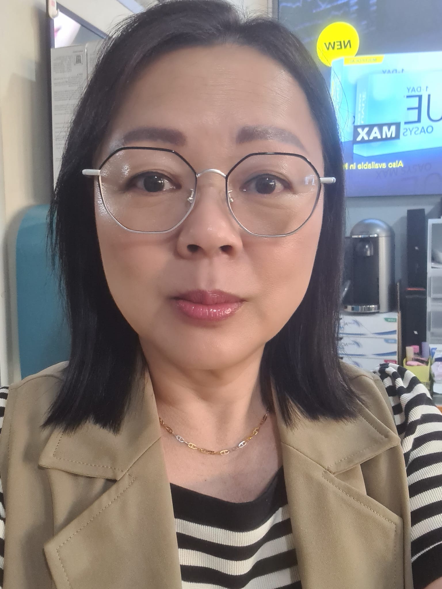 Ms Aw, the licensed optician at Eyesmate